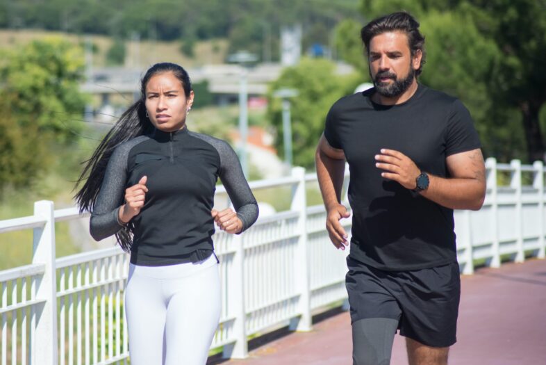 Couple Doing Aerobic Exercise: Running